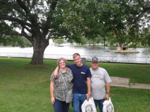 boy at college with parents