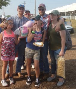 photo of family with fair food