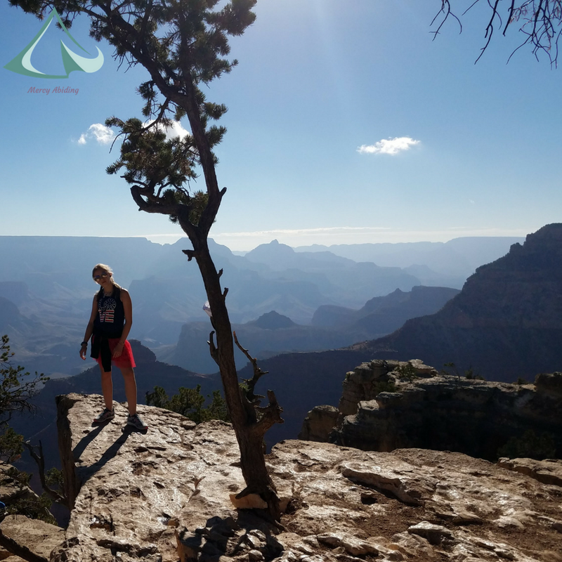 image of girl on rock