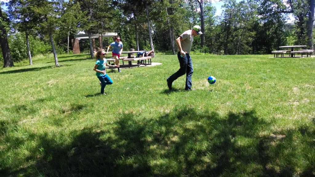 Kids kicking a ball